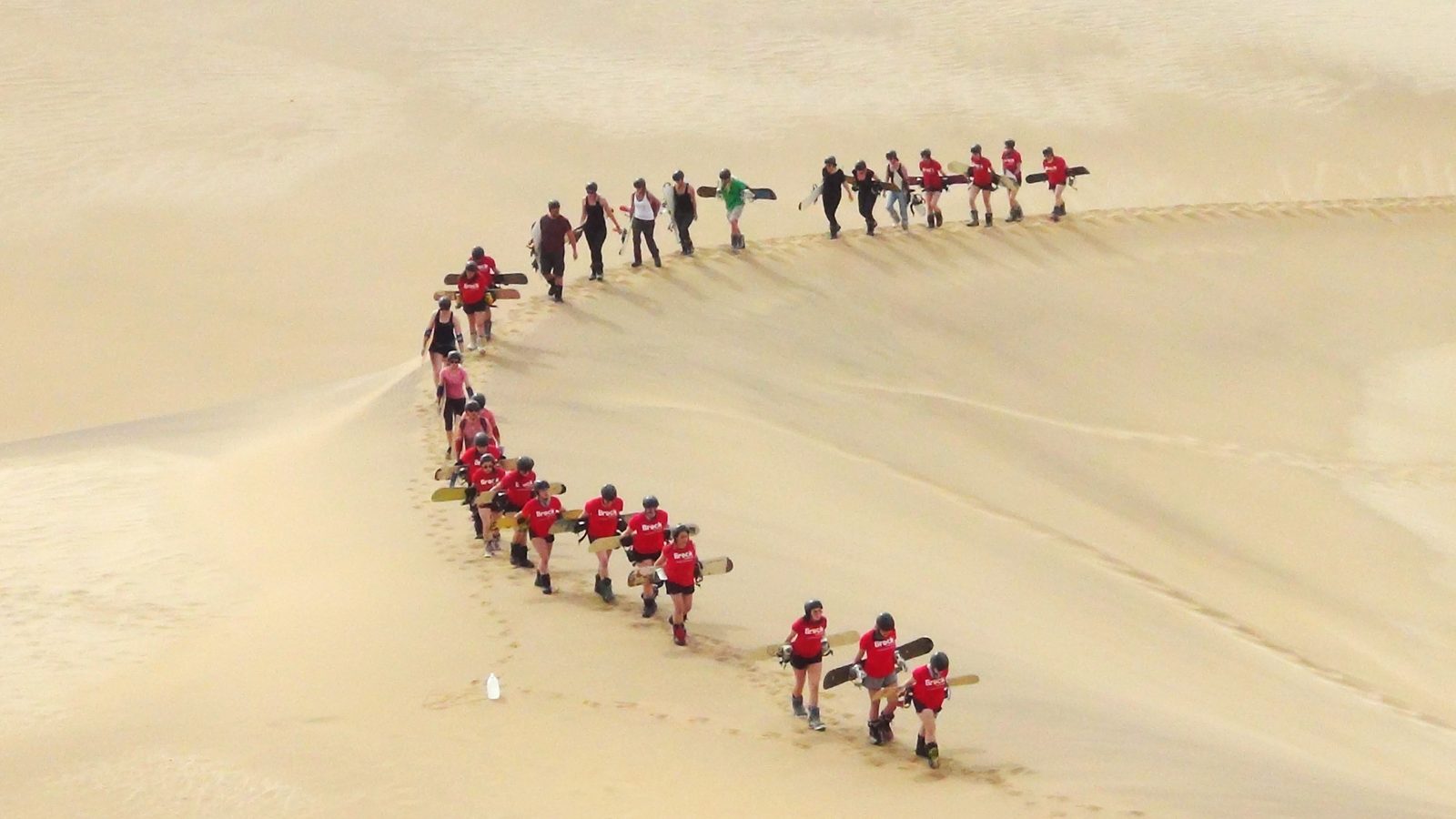 Morocco sand boarding tours in Erg Chigaga Sahara desert 